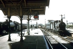 MARCH Loco; 65554 comes up through as Loco;  62589 on pilot duty rests in the bay,  Apr-1959  Digital Copies Available