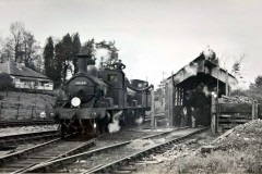 Lyme Regis. Loco; 30584 taking water with Loco;  30583 behind. Date; 10-04-1960. Digital Copies Available